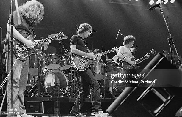 American rock group The Grateful Dead performing on stage, 1981. Left to right: Jerry Garcia , Bob Weir and Phil Lesh.