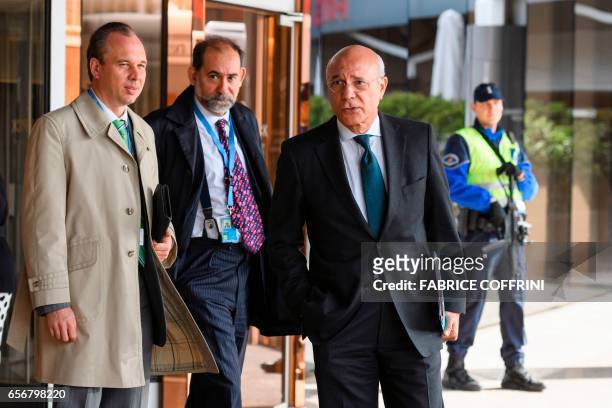 Syria envoy deputy Ramzy Ezzeldin Ramzy leaves a hotel after a meeting with Syrian government delegation on March 23, 2017 in Geneva. Syrian rivals...
