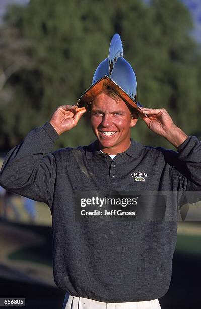 Garrett Willis wears the trophy after the Touchstone Energy Tuscon Open at the Omni Tuscon National Resort in Tuscon, Arizona.Mandatory Credit: Jeff...