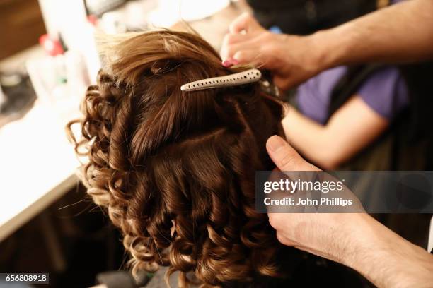 Model being styled backstage ahead of the New Gen show during Mercedes-Benz Istanbul Fashion Week March 2017 at Grand Pera on March 23, 2017 in...