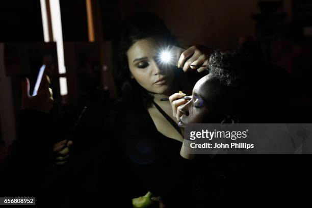 Model being styled backstage ahead of the New Gen show during Mercedes-Benz Istanbul Fashion Week March 2017 at Grand Pera on March 23, 2017 in...