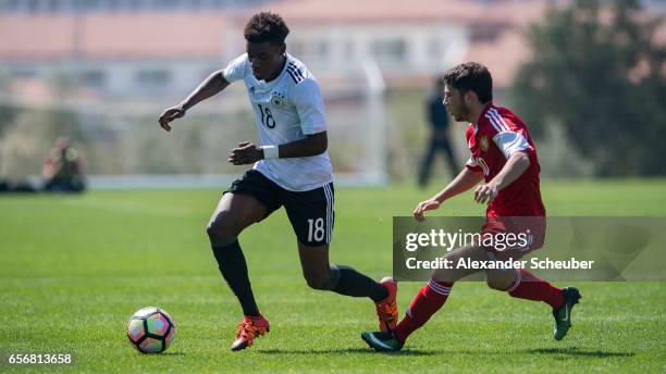 Zhirayr Shaghoyan of Armenia challenges Charles-Jesaja Herrmann of Germany during the UEFA U17 elite round match between Germany and Armenia on March...