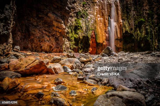 colourful waterfall "cascada de los colores" at caldera de taburiente, la palma, spain. - iron ore stock pictures, royalty-free photos & images