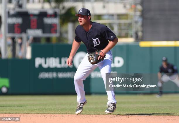 Joey Pankake of the Detroit Tigers fields during the Spring Training game against the Toronto Blue Jays at Publix Field at Joker Marchant Stadium on...
