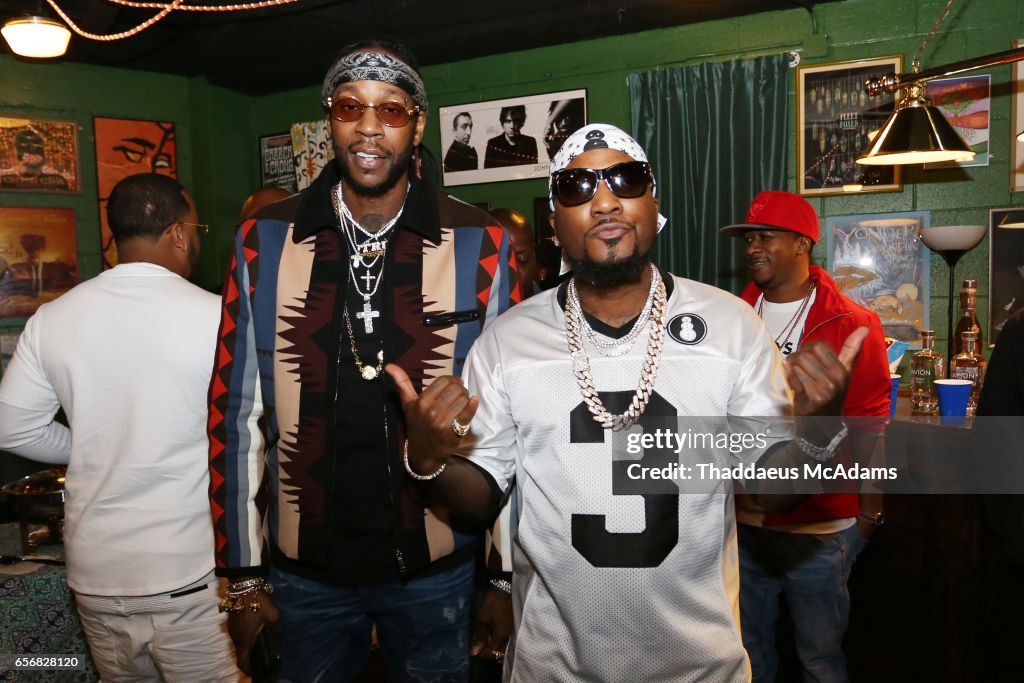 Rap artist 2 Chainz and Young Jeezy pose for a photo backstage at The Rap artist 2 Chainz and Young Jeezy pose for a photo backstage at The
