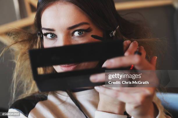 Model being styled backstage ahead of the Mert Erkan show during Mercedes-Benz Istanbul Fashion Week March 2017 at Grand Pera on March 23, 2017 in...