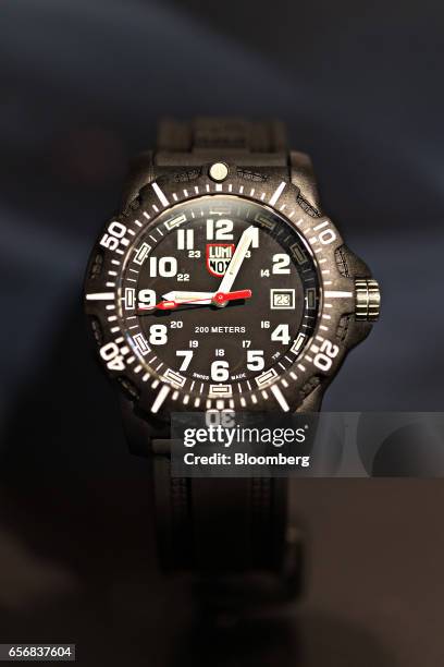 Luminox Navy Seal Colormark Series model wristwatch, produced by Mondaine Watch Ltd., stands on display at the company's booth during the 2017...