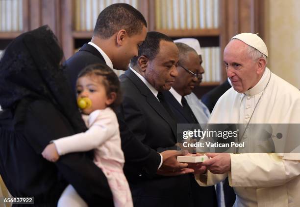 Pope Francis receives President of the Republic of Cameroon, Paul Biya and his delegation in a private audience at the Apostolic Palace on March 23,...