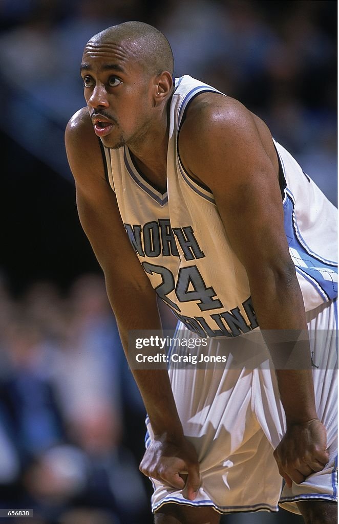 Max Owens of the North Carolina Tar Heels looks on from the court