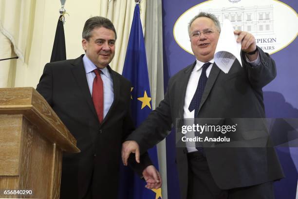 German Minister of Foreign Affairs Sigmar Gabriel and Greek Foreign Minister Nikos Kotzias hold a press conference after their meeting in Athens,...