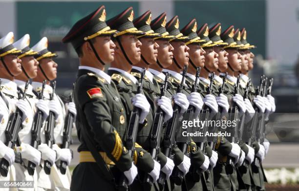 Chinese soldiers attend a military parade to mark Pakistan's National Day in Islamabad, Pakistan on March 23, 2017.