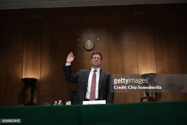 Jay Claton is sworn in before the Senate Banking Committee during his confirmation hearing to be chairman of the Securities and Exchange Commission...