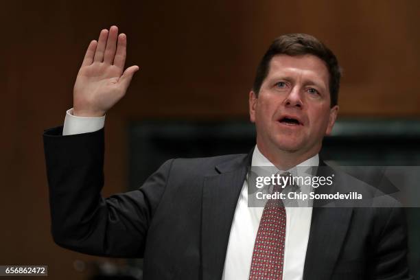 Jay Claton is sworn in before the Senate Banking Committee during his confirmation hearing to be chairman of the Securities and Exchange Commission...