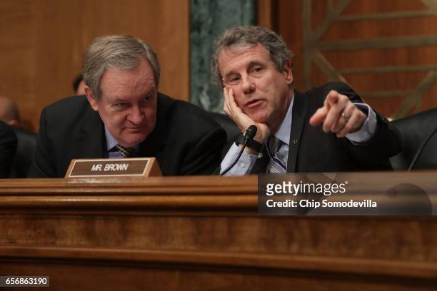 Senate Banking Committee Chairman Mike Crapo and ranking member Sen. Sherrod Brown talk during the confirmation hearing for Jay Claton to be...