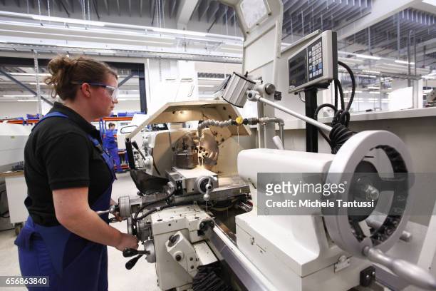 Young trainees operate mechanical Machine in the ABB training center on March 23, 2017 in Berlin, Germany.The Automation and robotic company ABB who...