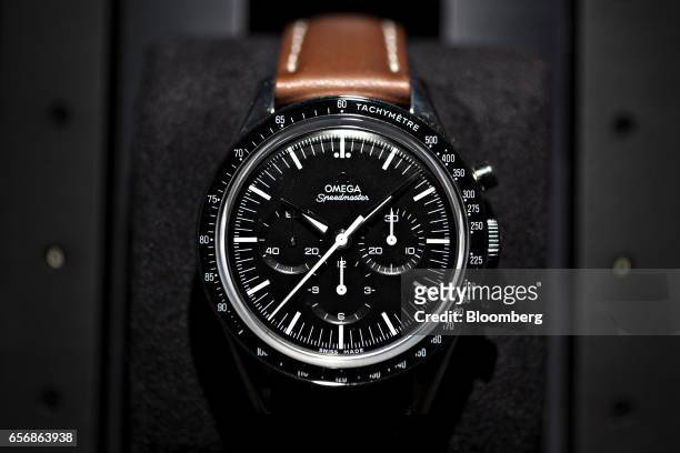 Speedmaster '57 chronograph model luxury wristwatch, produced by Omega, a unit of Swatch Group AG, stands on display during the 2017 Baselworld...