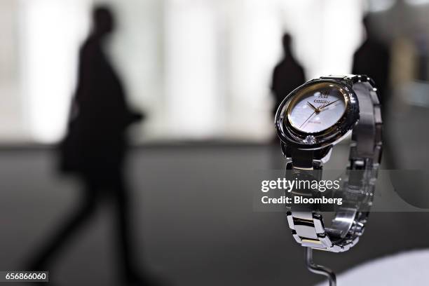 An eco-drive model wristwatch, produced by Citizen Watch Co., Ltd., stands on display during the 2017 Baselworld luxury watch and jewelry fair in...