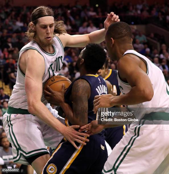 Boston Celtics center Kelly Olynyk is all over Indiana Pacers guard Aaron Brooks on this play in the fourth quarter. The Boston Celtics host the...