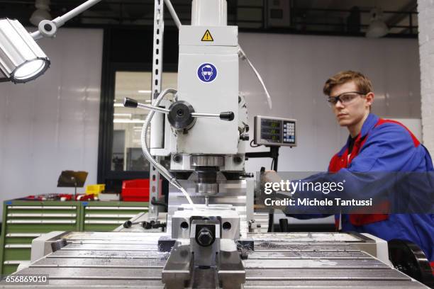 Young trainees operate mechanical Machine in the ABB training center on March 23, 2017 in Berlin, Germany.The Automation and robotic company ABB who...