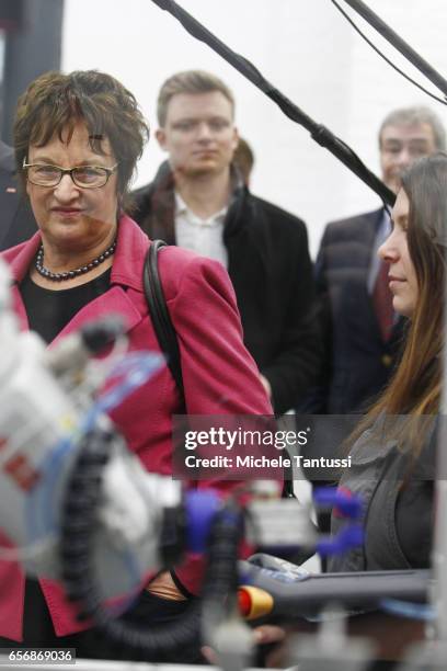 Germany Economy Ministry Brigitte Zypries observes young trainees as they operate mechanical Machine in the ABB training center on March 23, 2017 in...