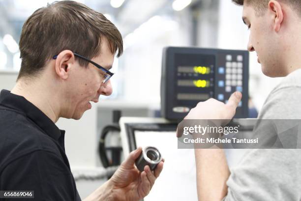 Young trainees operate mechanical Machine in the ABB training center on March 23, 2017 in Berlin, Germany.The Automation and robotic company ABB who...