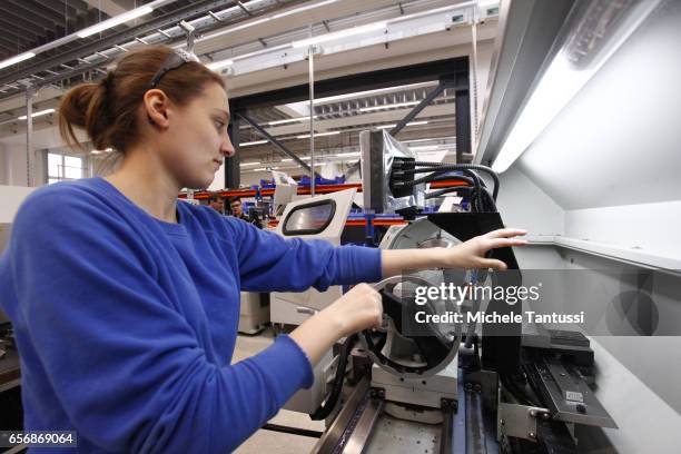 Young trainees operate mechanical Machine in the ABB training center on March 23, 2017 in Berlin, Germany.The Automation and robotic company ABB who...