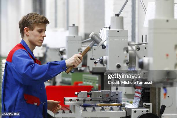 Young trainees operate mechanical Machine in the ABB training center on March 23, 2017 in Berlin, Germany.The Automation and robotic company ABB who...