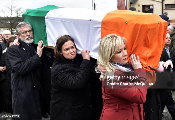 Sinn Fein leader Gerry Adams , Sinn Fein southern leader Mary Lou McDonald and Sinn Fein northern leader Michelle O'Neill carry the coffin of the...