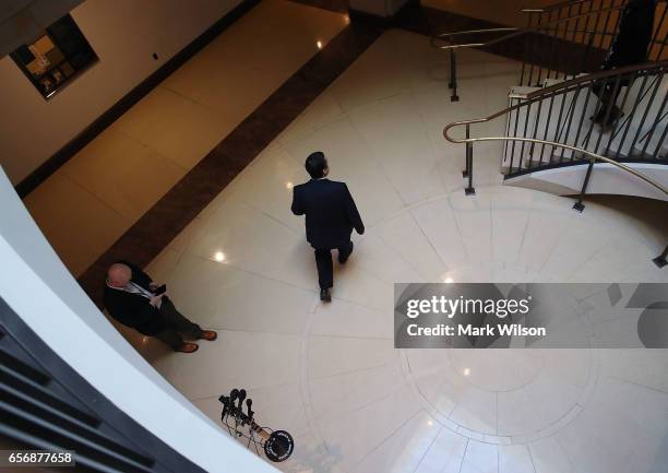 Chairman of the House Intelligence Committee, Devin Nunes walks away after speaking to reporters after leaving a closed meeting with fellow committee...