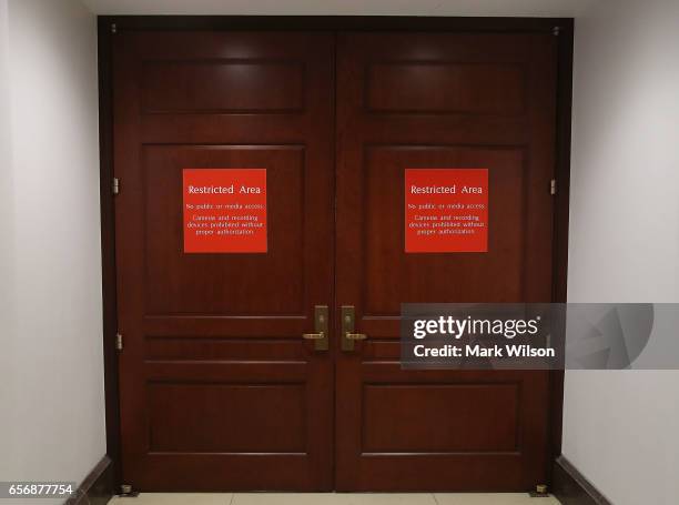 The doors are closed where the House Intelligence Committee is meeting, on Capitol Hill March 23, 2017 in Washington, DC. Chairman Devin Nunes has...