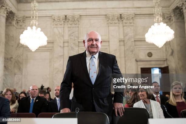 Sonny Perdue, President TrumpÕs nominee to lead the Agriculture Department, takes his seat as he arrives for his confirmation hearing before the...