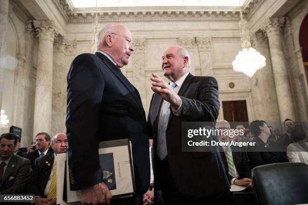 Sen. Patrick Leahy talks with Sonny Perdue, President TrumpÕs nominee to lead the Agriculture Department, before the start of Perdue's confirmation...