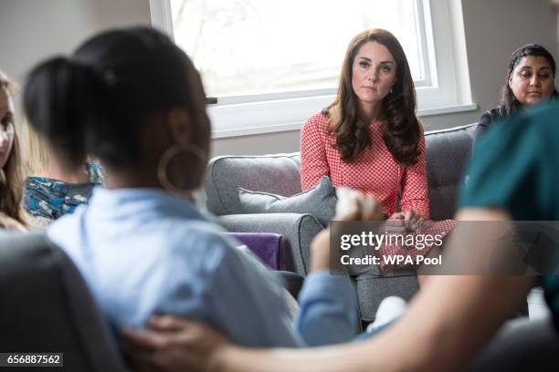 Catherine, Duchess of Cambridge sits in on a meeting with a parent support group at the launch of maternal mental health films ahead of mother's day...