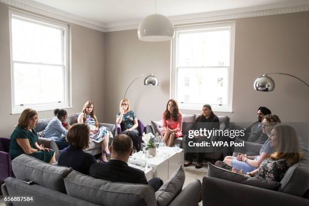 Catherine, Duchess of Cambridge sits in on a meeting with a parent support group at the launch of maternal mental health films ahead of mother's day...