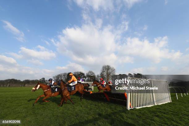 James Banks riding Orthodox Lad leads from Dave Crosse riding Karl Marx during the Recticel Handicap Hurdle race at Chepstow Racecourse on March 23,...
