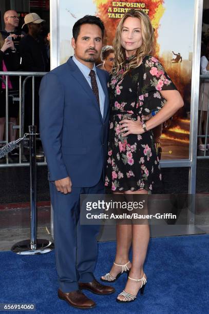 Actor Michael Pena and wife Brie Shaffer arrive at the premiere of Warner Bros. Pictures' 'CHIPS' at TCL Chinese Theatre on March 20, 2017 in...