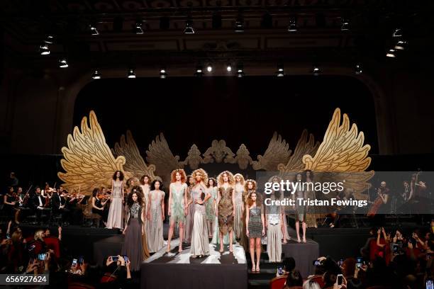 Cagla Sikel and other models walk the runway at the Tuvanam show during Mercedes-Benz Istanbul Fashion Week March 2017 at Grand Pera on March 23,...