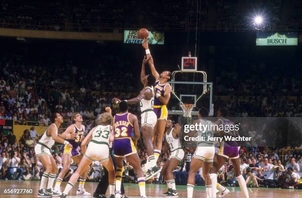 Finals: Los Angeles Lakers Kareem Abdul-Jabbar in action, tipoff vs Boston Celtics Robert Parish at Boston Garden. Game 5. Boston, MA 6/8/1984...