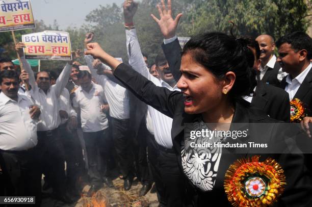 Lawyers stage a demonstration to oppose the Bar Council of India's suggestion to the Law Commission to ban strikes by advocates, on March 23, 2017 in...