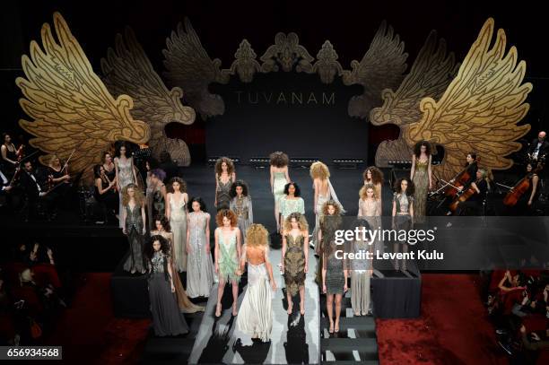 Cagla Sikel and other models walk the runway at the Tuvanam show during Mercedes-Benz Istanbul Fashion Week March 2017 at Grand Pera on March 23,...