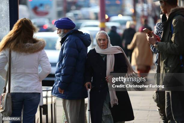 People go about their daily lives in Soho Road, Handsworth, famous for its multi-cultural residents on March 23, 2017 in Birmingham, England. After...