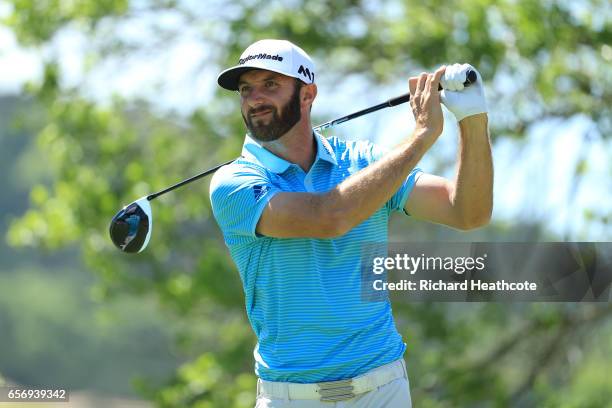 Dustin Johnson tees off on the 6th hole of his match during round two of the World Golf Championships-Dell Technologies Match Play at the Austin...