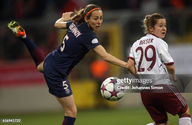 Nicole Rolser of Bayern fights for the ball with Sabrina Delannoy of Paris St. Germain during the UEFA women's champions league quarter finals at...