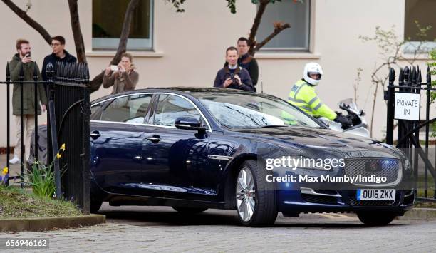 Catherine, Duchess of Cambridge arrives in her Jaguar car to attend the launch of maternal mental health films ahead of mother's day at the Royal...