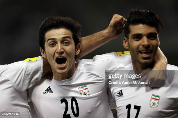 Sardar Azmoun and Mehdi Taremi of Iran celebrate after first goal during Qatar against Iran - FIFA 2018 World Cup Qualifier on March 23, 2017 in...