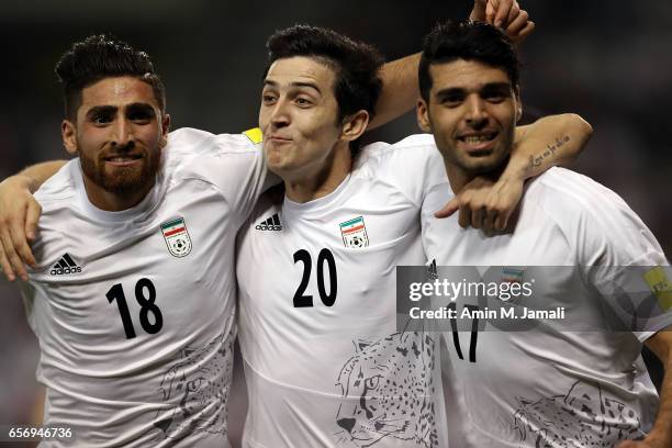 Alireza Jahan Bakhsh and Sardar Azmoun and Mehdi Taremi of Iran celebrate after first goal during Qatar against Iran - FIFA 2018 World Cup Qualifier...