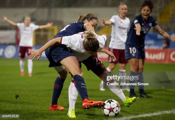 Nicole Rolser of Bayern fights for the ball with Irene Paredes of Paris St. Germain during the UEFA women's champions league quarter finals at...