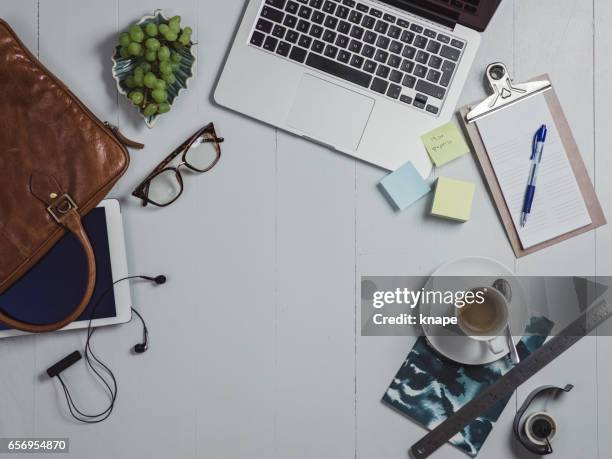 overhead business angles still life of office desk - reading glasses top view stock pictures, royalty-free photos & images