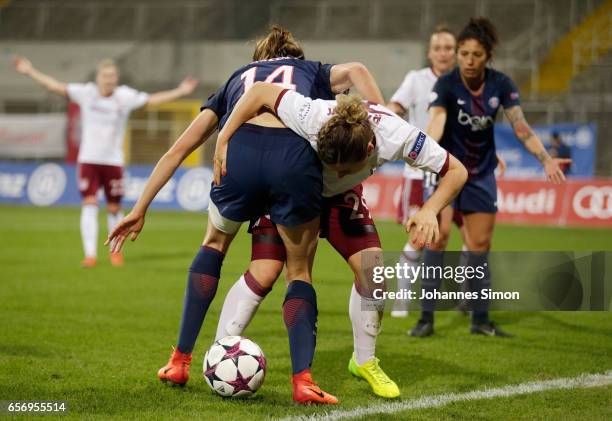 Nicole Rolser of Bayern fights for the ball with Irene Paredes of Paris St. Germain during the UEFA women's champions league quarter finals at...