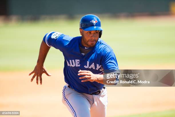 Gregorio Petit of the Toronto Blue Jays runs home during a spring training game against the Pittsburgh Pirates at LECOM Park on March 19, 2017 in...